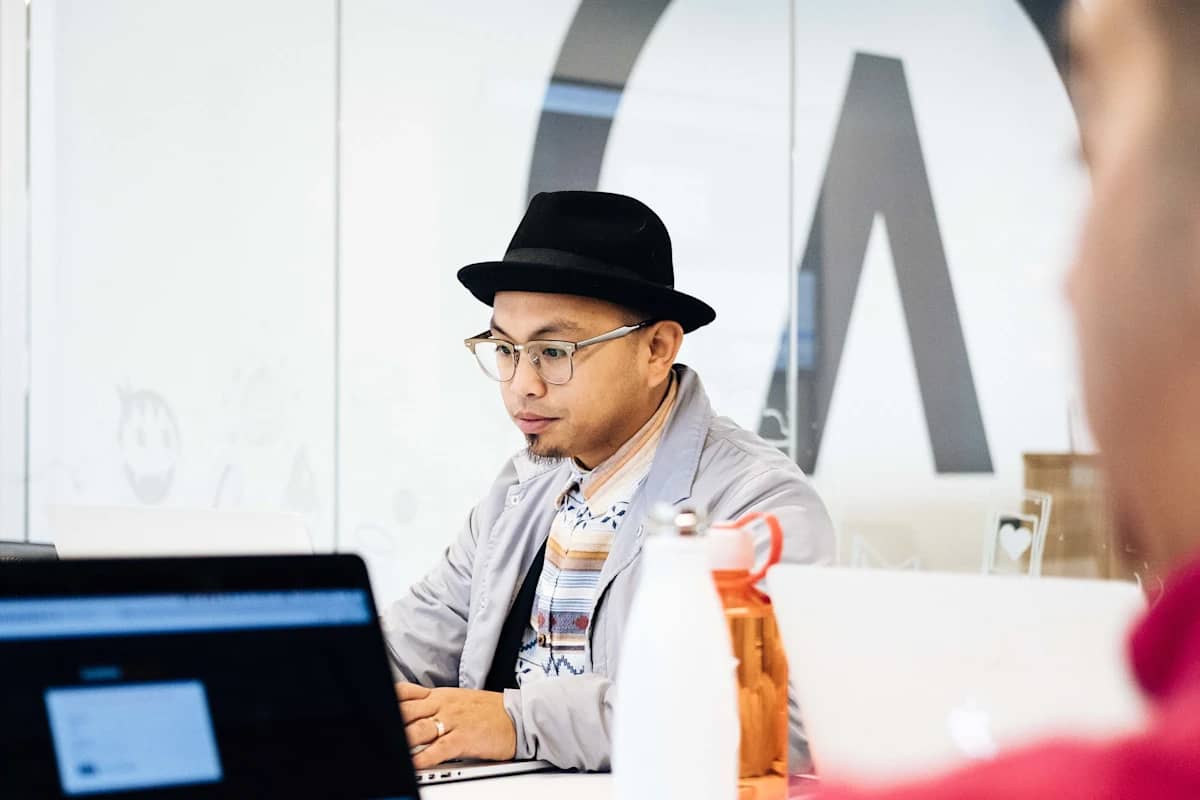 Developer Working Satisfied client smiling